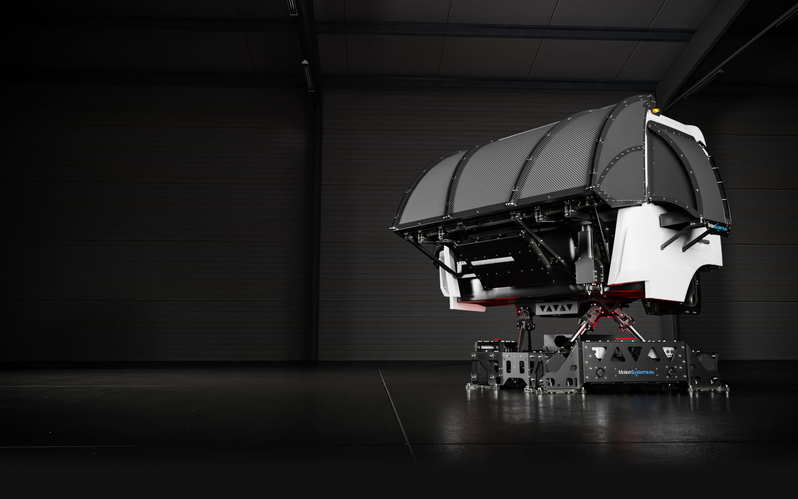 Truck Simulator TS-10 cab mounted on a 6DOF motion platform in an empty hall