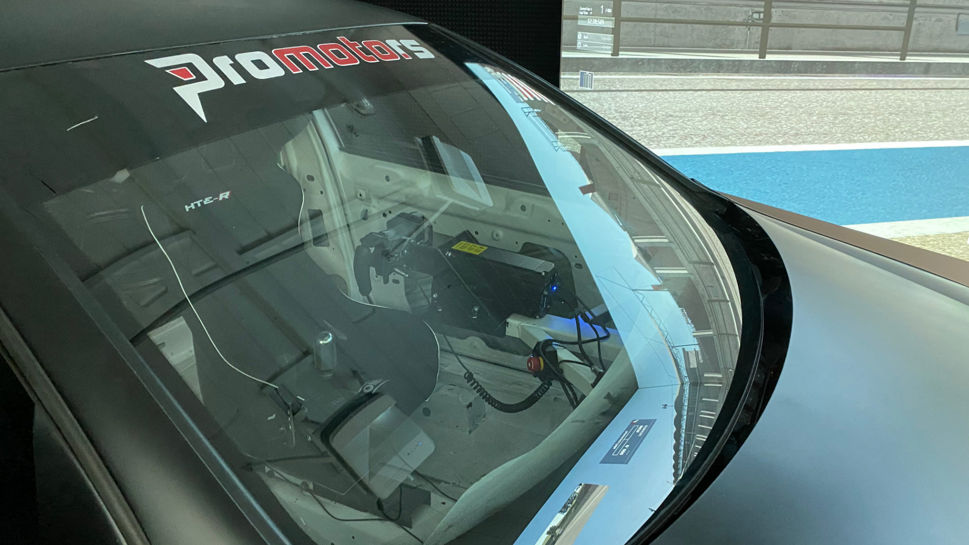 Close-up of the simulator car body seen through the windshield